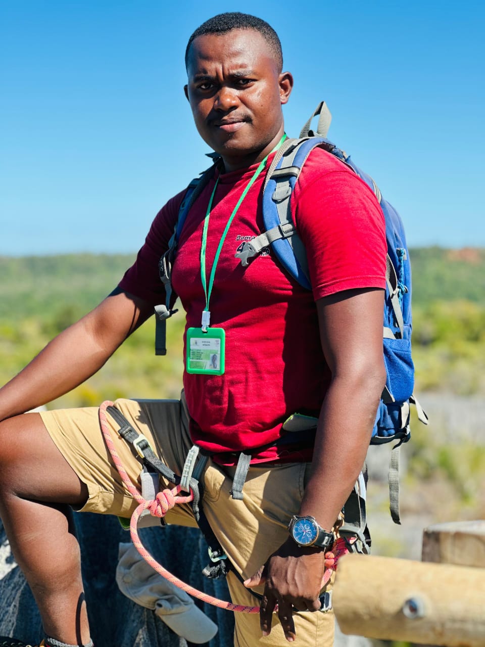 Astani Ringo standing on the limestone at Tsingy de Bemaraha, looking towards the camera